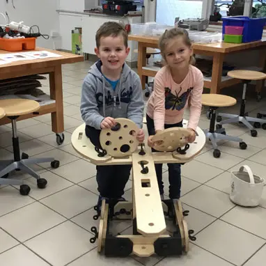 Grade 1 students with their self-built vehicle